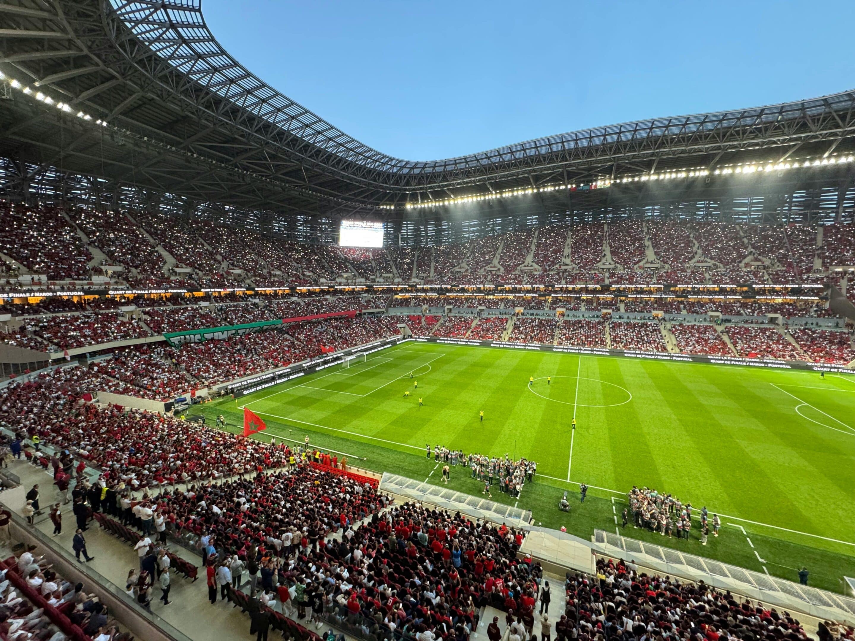 Man explaining to colleagues in a meeting